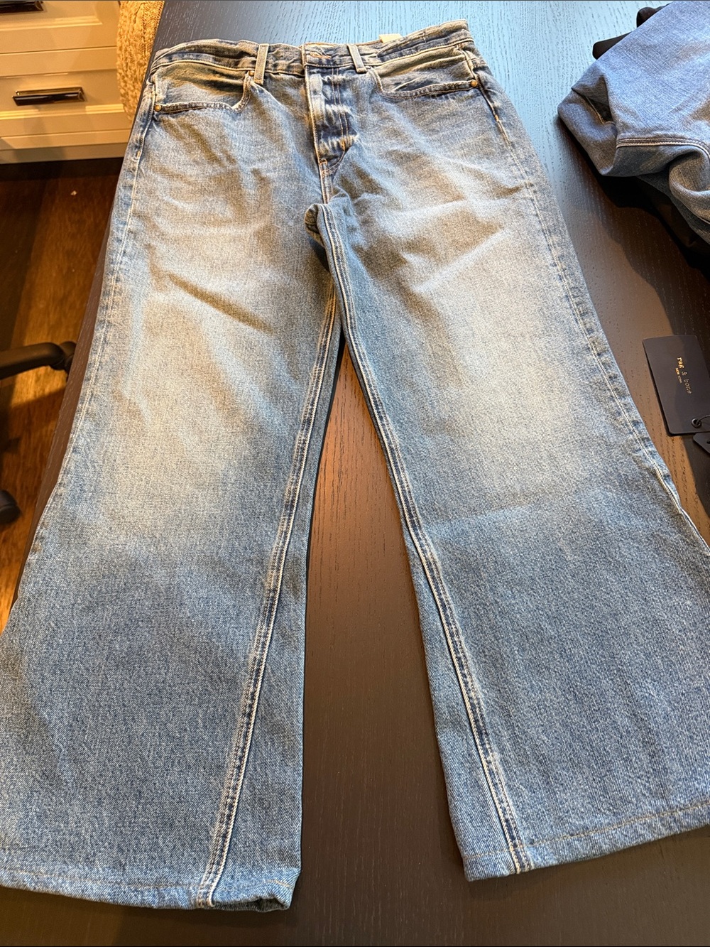 THE GREAT. Women's Flared Wide-Leg Jeans in Light Blue Denim